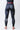 Back view of the black GB Essentials Womens Compression Pants showing the full length, center seam, and white circled GB logo on the calf.