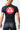 Back view of a woman wearing the black GB Essentials Womens Ranked Rashguard with the large red Gracie Barra circle shield logo across the shoulders