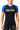 Woman wearing the GB Essentials Womens Ranked Rashguard in blue, front view showing EQUIPE Gracie Barra chest print and blue raglan sleeves