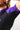 Close up of the shoulder and underarm of the GB Essentials Womens Ranked Rashguard in purple showing the seam free underarm and textured black side panel