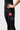 Black GB Essentials Womens Training Shorts with the red Barra Shield on the left thigh, a side slit hem and gray striped panel detail.