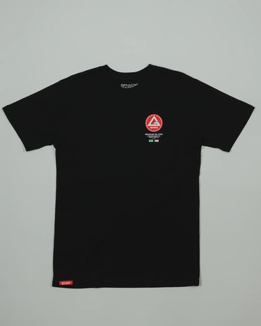 Black GB HQ 20th Anniversary Tee laid flat on a light gray background, featuring the red Barra Shield on the left chest and woven GB Wear label at the hem.