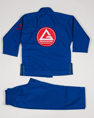 Blue GBK Lite Ripstop kids’ kimono set with large Red Shield patch on the back.
