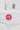 Detail of white GBK belt and Red Shield patch on pants of the kids’ kimono.
