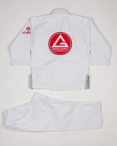 Kids’ white GBK Lite Ripstop kimono set with large Red Shield patch on the back.