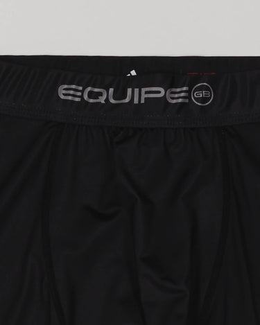 Close-up of the waistband on the black III Stripes Compression Pants by adidas, featuring silver EQUIPE GB branding.