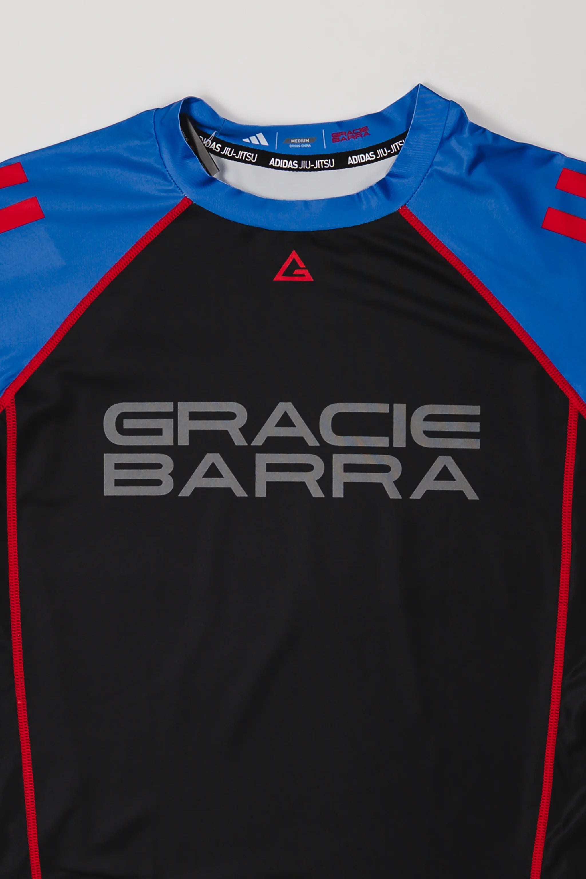 III Stripes Ranked Rashguard by adidas - Blue