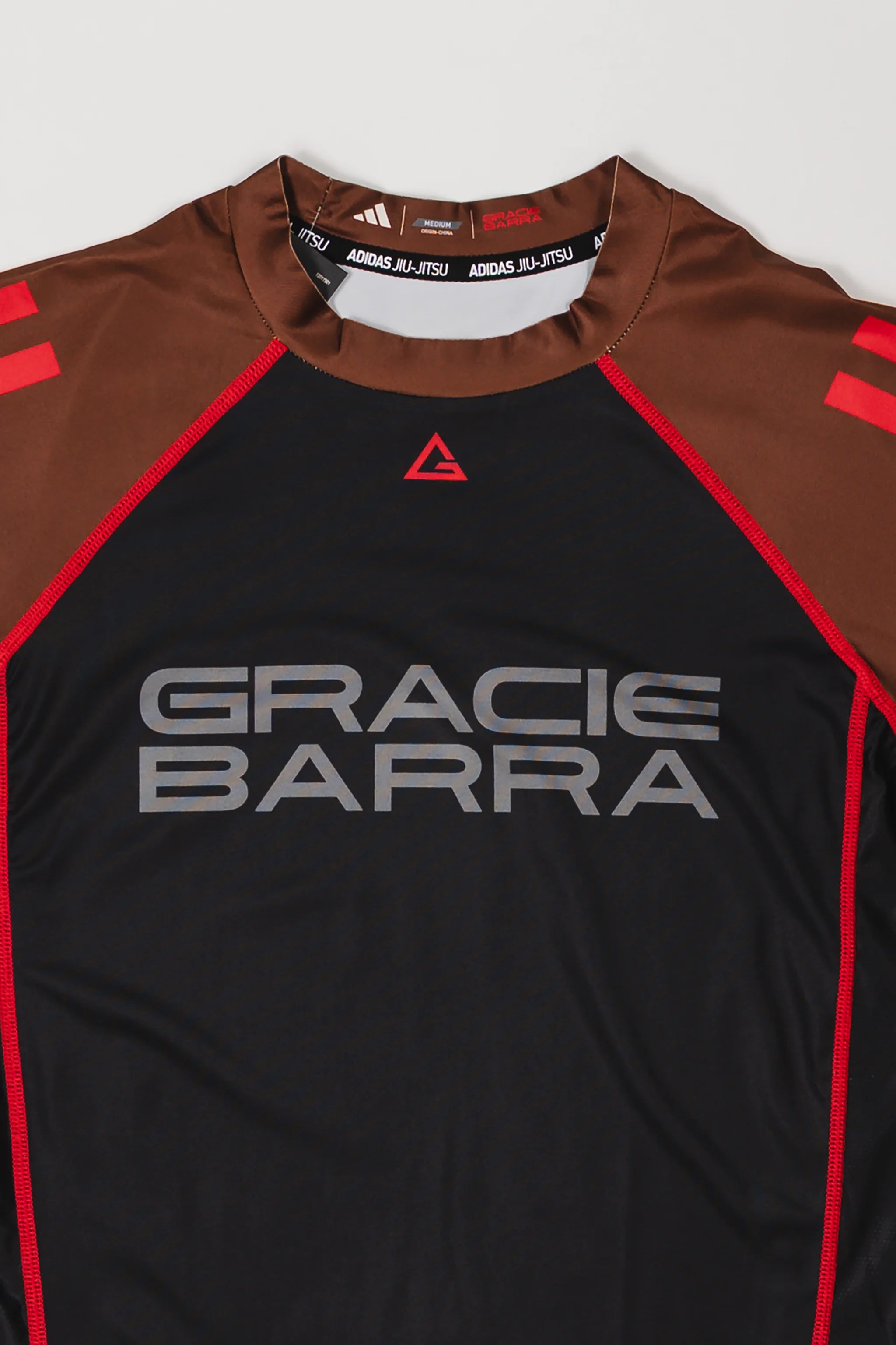 III Stripes Ranked Rashguard by adidas - Brown