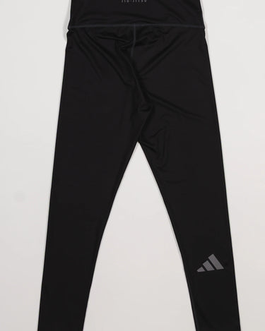 Back view of the GB x adidas III Stripes Women’s Compression Tights in black, showing the adidas logo on the lower leg and “Jiu-Jitsu” branding on the waistband.