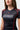 Front torso view of the black III Stripes Womens Ranked Rashguard by adidas showing the gray stacked Gracie Barra logo and red flatlock side seams