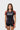 Student wearing the brown III Stripes Womens Ranked Rashguard by adidas, with brown raglan sleeves, three red stripes and gray stacked Gracie Barra logo