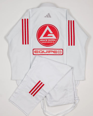 Back view of folded white GB x adidas III Stripes Women’s Kimono with pants, featuring Red Shield and EQUIPE patches, adidas logo at collar, and GB Red 3-Stripes on sleeves and pant leg.