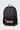 Front view of the Jiu Jitsu Kids Backpack in Black/Grey showing the illustrated jiu-jitsu pattern, front zip pocket, and Gracie Barra logo