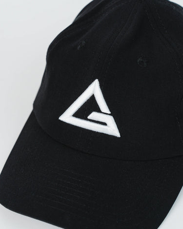 Close-up of black Gracie Barra Legacy G Performance Cap with embroidered white Legacy G logo on the front panel.