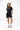 Legacy Womens Active Tee in black, full-length front view on model with hands in pockets, crew neckline and white Legacy G chest logo.