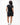 Legacy Womens Active Tee in black, full-length back view on standing model showing Gracie Barra wordmark at upper back and flatlock seams.