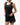 Legacy Womens Performance Racerback Tank in black, front view on model with hands at the hem, scoop neckline and white Legacy G chest logo.