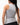 Legacy Womens Performance Racerback Tank in grey, back view on model showing racerback design and stacked Gracie Barra wordmark at upper back.
