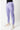 Side view of the lavender Gracie Barra Legacy Womens Track Jogger showing the zippered side pocket, white Legacy G and ribbed ankle cuffs.