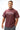 Man wearing the maroon Living Legacy Boxy Tee with arched Jiu-Jitsu chest print and Gracie Barra wordmark, styled with gray pants.