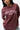 Woman wearing the oversized maroon Living Legacy Boxy Tee, close front view of the arched Jiu-Jitsu print and Gracie Barra wordmark.
