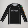 Full front view of the Lutador Longsleeve Ranked Rashguard in black, featuring the black torso, black raglan sleeves, white Gracie Barra wordmark, Brazilian flag arm patch, and gold ‘Lutador’ sleeve print.