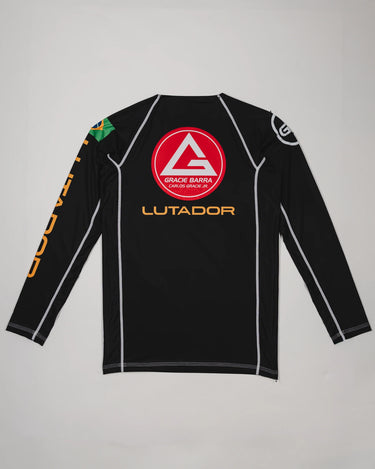Back view of the black Lutador Longsleeve Ranked Rashguard featuring the red Gracie Barra shield, gold ‘Lutador’ text, and Brazilian flag patch on the sleeve.