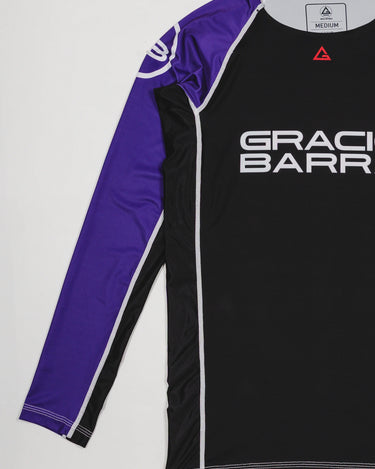 Side view of the Lutador Longsleeve Ranked Rashguard in purple, showing the full purple raglan sleeve with the white GB circle logo and the black torso with Gracie Barra branding.