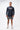 Lutador Mens Active Longsleeve Tee in navy, full front view on model showing Gracie Barra Lutador chest graphic, worn with grey shorts.