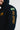 Sleeve detail of the navy Lutador hoodie with vertical gold Jiu-Jitsu print, Brazil flag patch and lined hood.