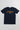 Navy Gracie Barra Lutador mens tee flat lay, front, with the gold LUTADOR chest print, white Equipe GB badge, and gold triangle logo on the sleeve.