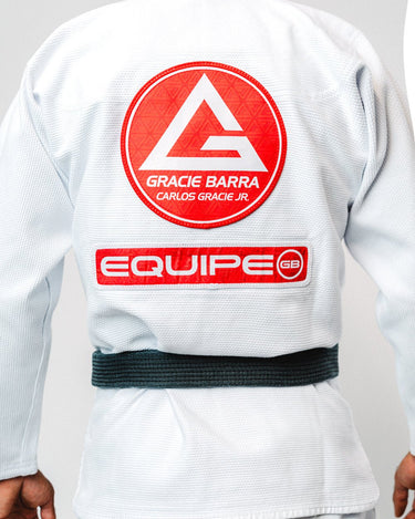 Back detail of white BJJ Kimono with Gracie Barra Competition patches