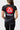 Back of the black Gracie Barra Proximity Womens Training Tee showing the red Barra Shield and white Equipe print over gray diagonal panels.