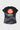 Back layflat of the black Gracie Barra Proximity womens training tee with the red Barra Shield graphic, white Equipe print, and gray geometric stripes.