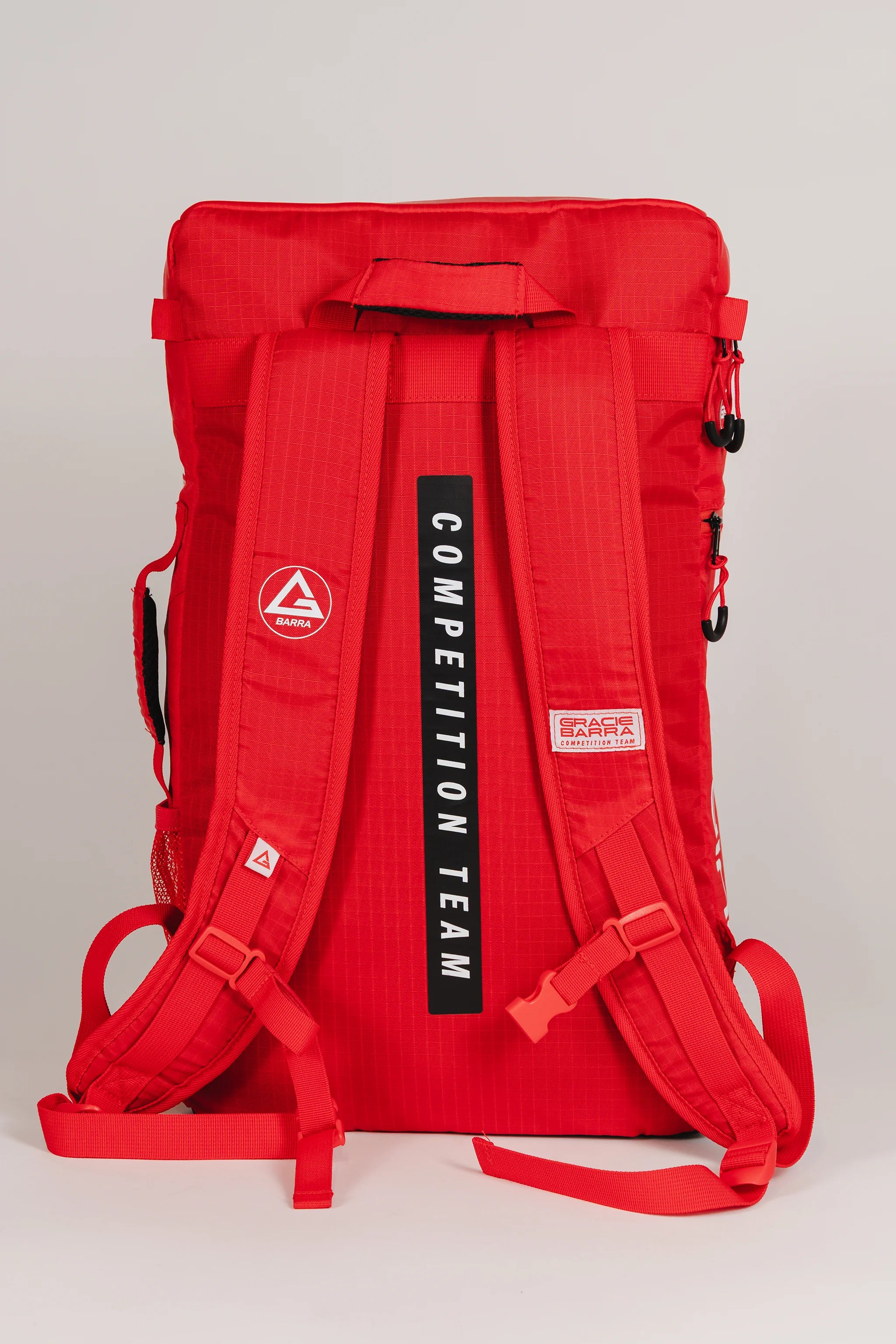 Back view of Red Comp GB4 Backpack showing padded shoulder straps with “Competition Team” detail, GB patches, and adjustable fit for training or travel.