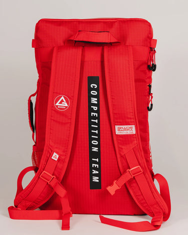 Back view of Red Comp GB4 Backpack showing padded shoulder straps with “Competition Team” detail, GB patches, and adjustable fit for training or travel.