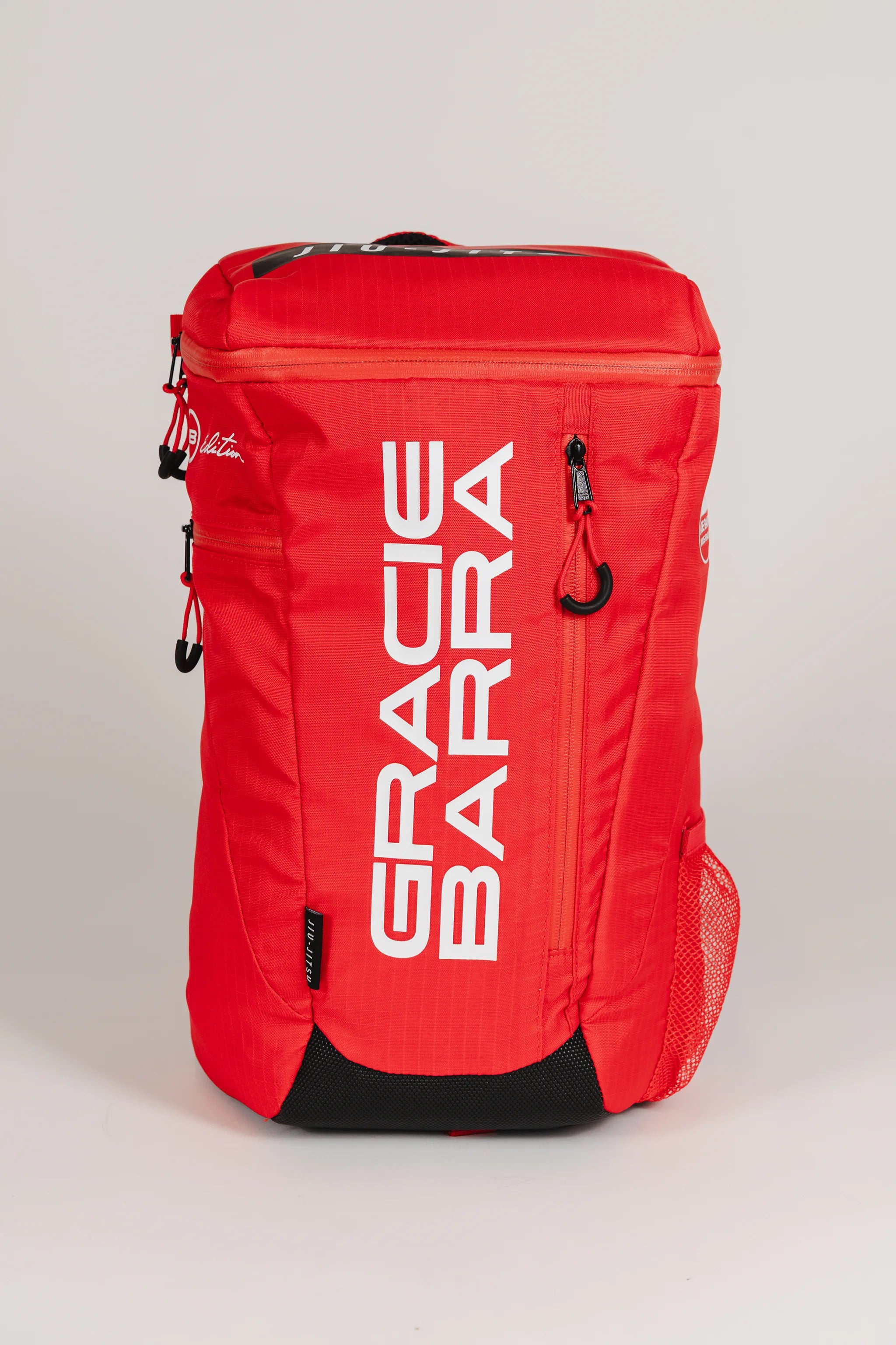 Red GB4 Kids Backpack with “Gracie Barra” text logo, front-facing on light background — part of the Red Comp Collection for young jiu-jitsu athletes.