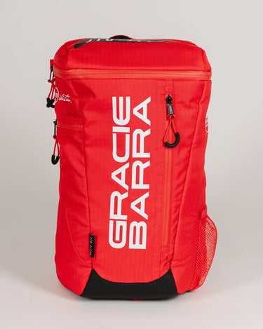 Red GB4 Kids Backpack with “Gracie Barra” text logo, front-facing on light background — part of the Red Comp Collection for young jiu-jitsu athletes.