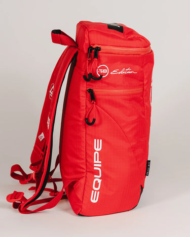 Side view of Red GB4 Kids Backpack from the Gracie Barra Red Comp Collection, showing “Equipe” and “GB Edition” logos with padded straps and ventilation panel.