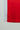 Close-up of the Men’s Red Comp Team Jersey hem showing the tonal Legacy G geometric pattern and white side panel detail.