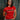 Professor Keanna wearing the Red Comp Women’s Team Jersey featuring the official Jiu-Jitsu Competition Team graphic, photographed against a dark backdrop.