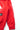 Close-up of Gracie Barra 40 Years Competition Team Men’s red zip hoodie sleeve featuring raised COMPETITION TEAM text and GB emblem on premium fleece fabric