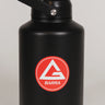 Black stainless steel 128 oz Red Shield bottle with the Gracie Barra Barra Red Shield logo on the front, photographed against a light background.