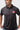 Black Red Shield Terra Mar polo on a student, close front view with the collar, button placket and red Barra Shield chest logo.