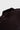 Close-up of the curved back yoke seam and collar stitching on the black Gracie Barra Red Shield Terra Mar polo