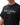 Rio Roots Mens Tee in Black — front close-up of the Gracie Barra Estd 1986 chest graphic in grey on premium heavyweight cotton.
