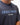 Rio Roots Mens Tee in Navy — front close-up of the light blue Gracie Barra Estd 1986 chest graphic on premium heavyweight cotton.