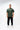 Rio Roots Mens Tee in Forest Green - full front view on model showing the Gracie Barra Estd 1986 chest graphic and relaxed oversized fit.