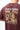 Rio Roots men's tee in mahogany, back view with white GRACIE BARRA over a tan archival photo of the original Gracie Barra mats and KEEPING THE LEGACY ALIVE ESTD 1986 print.