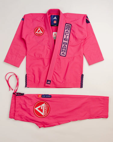 Pink Ripstop Lite Women’s BJJ kimono set by adidas and Gracie Barra, featuring military-grade ripstop jacket, drawstring pants, and embroidered Red Shield patch.